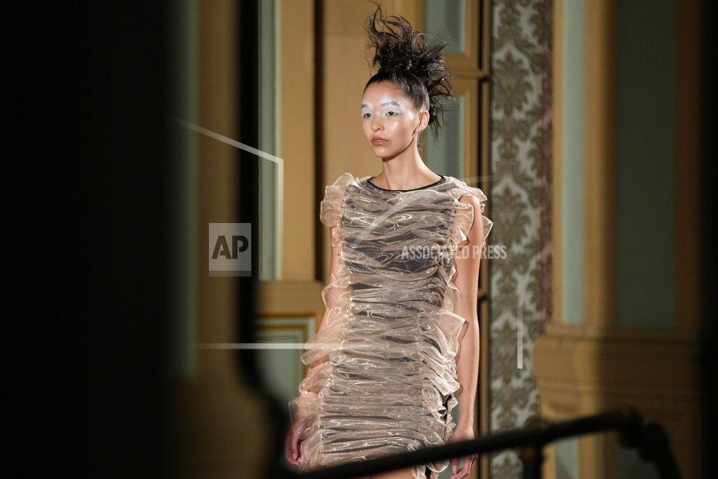 Luca Bruno A model wears a creation of Francesca Liberatore Spring Summer 2022 collection, unveiled during the Milan Fashion Week, in Milan, Italy, Sunday, Sept. 26, 2021. (AP Photo/Luca Bruno)