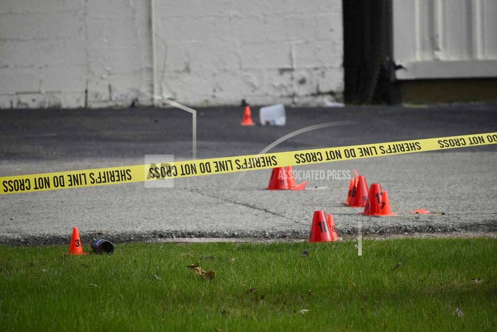 Deneen Smith Evidence markers and police tape were in abundance outside the Somers House Tavern and down 15th Place, where shots were fired in a fatal shooting Sunday, April 18, 2021, in Kenosha, Wis. Several people were killed and a few were seriously wounded in a shooting at the busy tavern in southeastern Wisconsin early Sunday, sheriff's officials said. (Deneen Smith/The Kenosha News via AP)