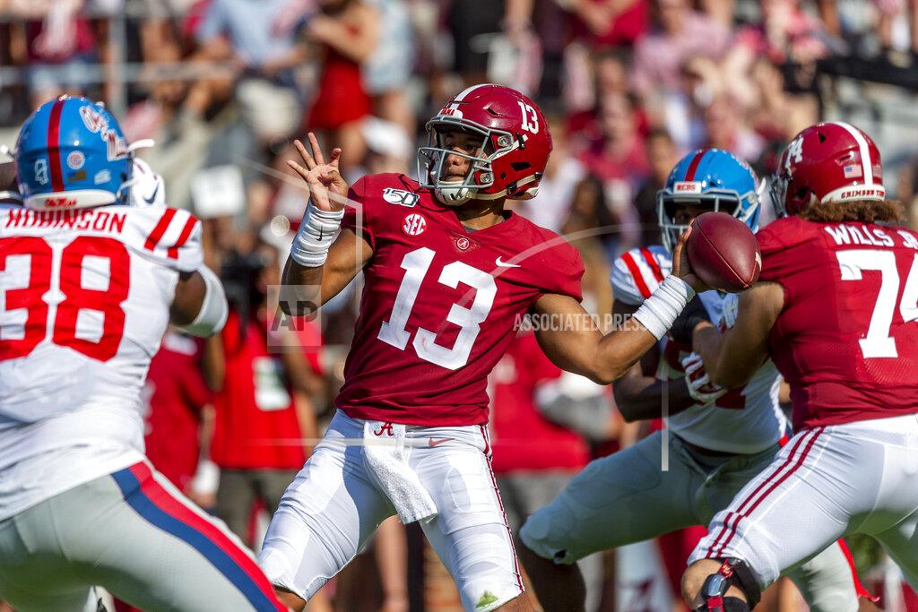 Vasha Hunt FILE - In this Sept. 28, 2019, file photo, Alabama quarterback Tua Tagovailoa (13) throws a pass during the first half of the team's NCAA college football game against Mississippi in Tuscaloosa, Ala. With an eye on the future, the Dolphins loaded up in the draft with 11 picks -- highlighted by quarterback Tua Tagovailoa. (AP Photo/Vasha Hunt, File)