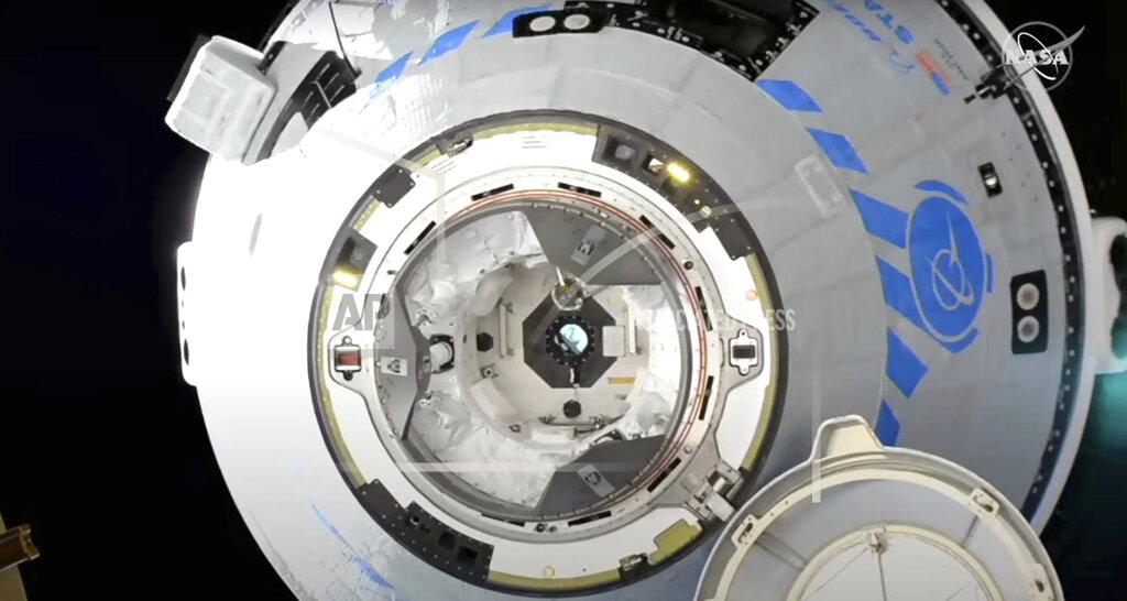 Uncredited This image from NASA TV shows the Boeing Starliner preparing to dock at the International Space Station, Friday, May 20, 2022. Boeing's astronaut capsule has arrived at the International Space Station in a critical repeat test flight. Only a test dummy was aboard the capsule for Friday's docking, a huge achievement for Boeing after years of false starts. (NASA via AP)