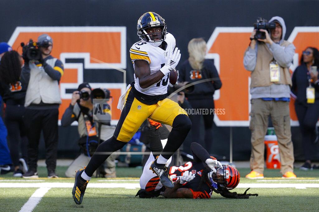 Frank Victores Pittsburgh Steelers wide receiver James Washington (13) runs for a touchdown during the second half an NFL football game against the Cincinnati Bengals, Sunday, Nov. 24, 2019, in Cincinnati. (AP Photo/Frank Victores)