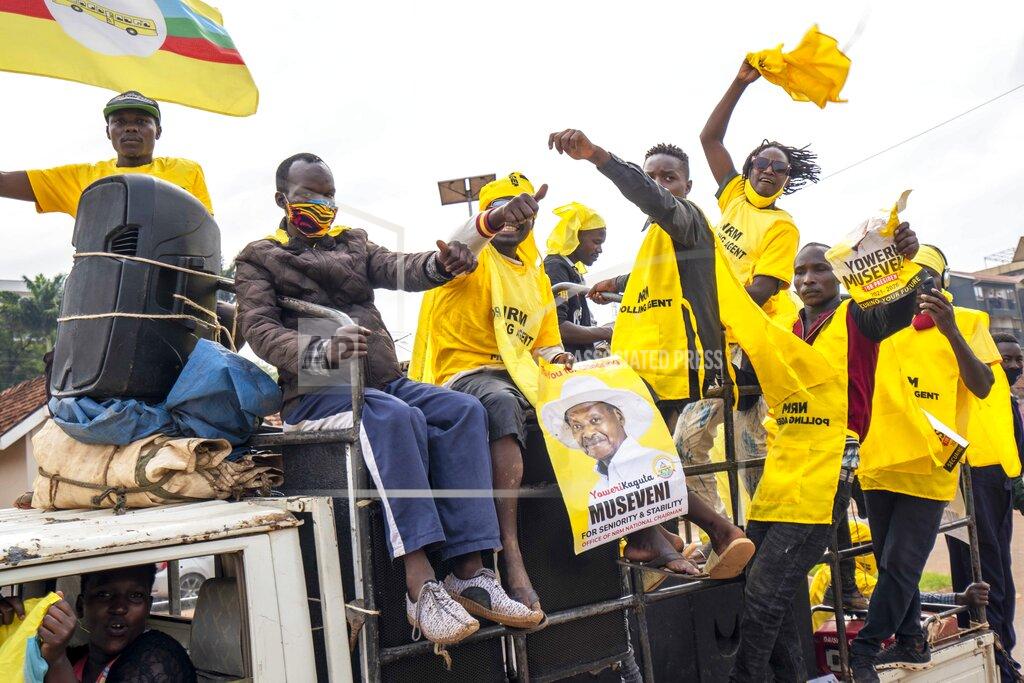 Jerome Delay Supporters of Ugandan President Yoweri Kaguta Museveni celebrate in Kampala, Uganda, Saturday Jan. 16, 2021, after their candidate was declared winner of the presidential elections. Uganda’s electoral commission says longtime President Yoweri Museveni has won a sixth term, while top opposition challenger Bobi Wine alleges rigging and officials struggle to explain how polling results were compiled amid an internet blackout. In a generational clash widely watched across the African continent, the young singer-turned-lawmaker Wine posed arguably the greatest challenge yet to Museveni. (AP Photo/Jerome Delay)
