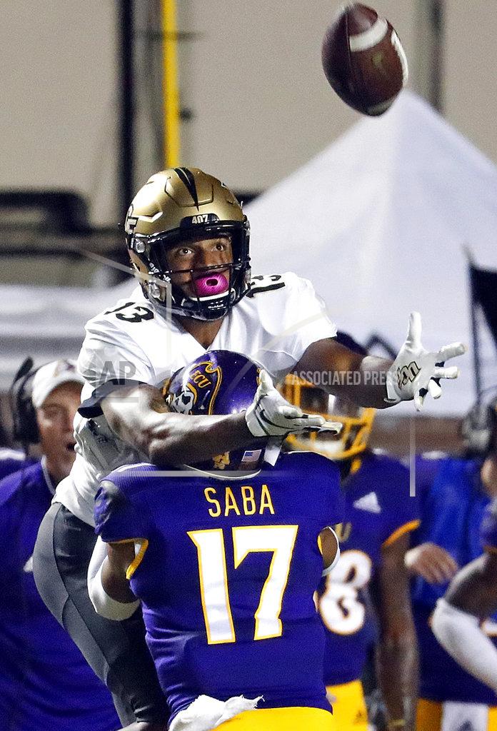 Karl B Deblaker East Carolina's Warren Saba (17) interferes with Central Florida's Gabriel Davis (13) on a pass attempt during the first half of an NCAA college football game in Greenville, N.C., Saturday, Oct. 20, 2018. (AP Photo/Karl B DeBlaker)