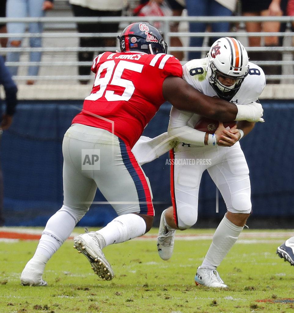Rogelio V. Solis Auburn quarterback Jarrett Stidham (8) is sacked by Mississippi defensive tackle Benito Jones (95) during the first half of an NCAA college football game on Saturday, Oct. 20, 2018, in Oxford, Miss. Auburn won 31-16. (AP Photo/Rogelio V. Solis)