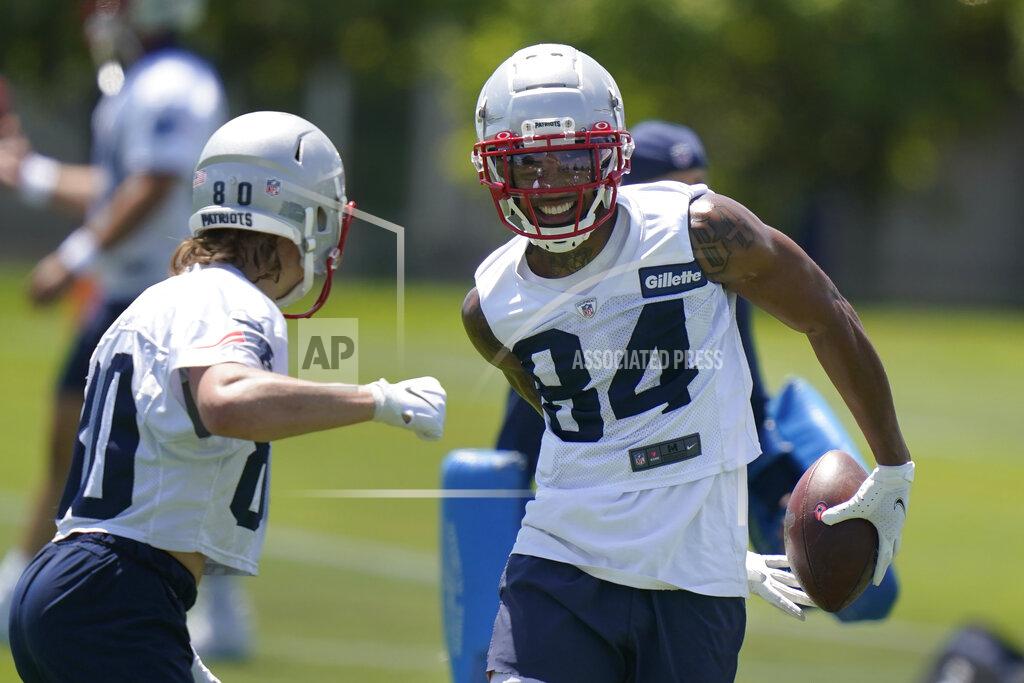 Steven Senne New England Patriots wide receivers Gunner Olszewski, left, and Kendrick Bourne (84) work on a drill during NFL football practice in Foxborough, Mass., Thursday, May 27, 2021. (AP Photo/Steven Senne)