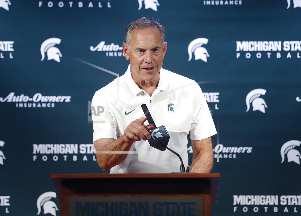 Michigan State football coach Mark Dantonio talks with reporters during the team's NCAA college football media day, Monday, Aug. 5, 2019, in East Lansing, Mich. (AP Photo/Al Goldis)
