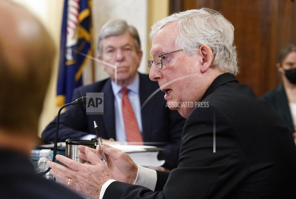J. Scott Applewhite Senate Minority Leader Mitch McConnell of Ky., right, speaks as Sen. Roy Blunt, R-Mo., listens during a Senate Rules Committee hearing at the Capitol in Washington, Tuesday, May 11, 2021. (AP Photo/J. Scott Applewhite)