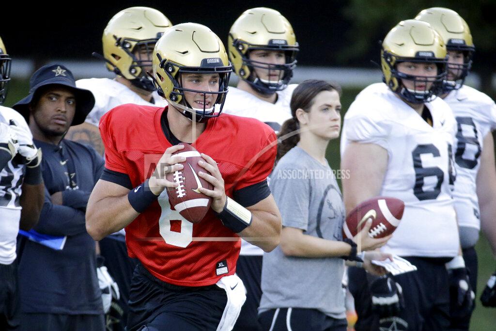 Mark Humphrey In this Aug. 5, 2019, photo, Vanderbilt quarterback Riley Neal (6) runs a drill during an NCAA college football practice in Nashville, Tenn. Vanderbilt has won at least five games each of the past three seasons and reached two bowls in that span. They've also won three straight against in-state rival Tennessee for their longest winning streak in this series since the 1920s. (AP Photo/Mark Humphrey)