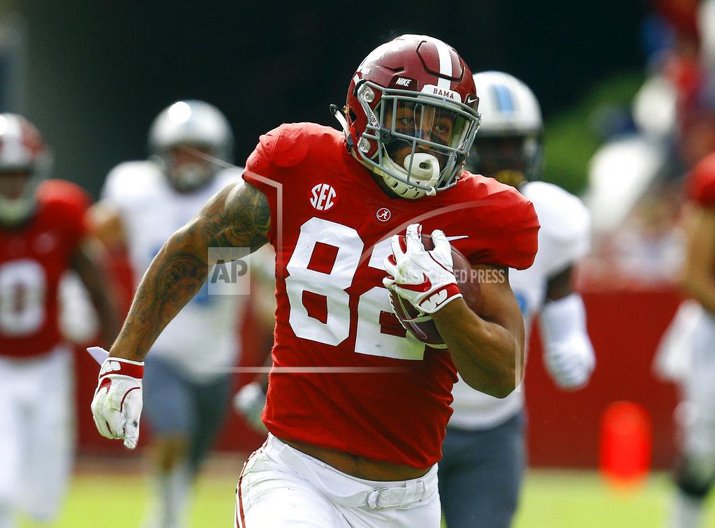 Butch Dill Alabama tight end Irv Smith Jr. (82) carries the ball in for a touchdown against Citadel during the second half of an NCAA college football game, Saturday, Nov. 17, 2018, in Tuscaloosa, Ala. (AP Photo/Butch Dill)