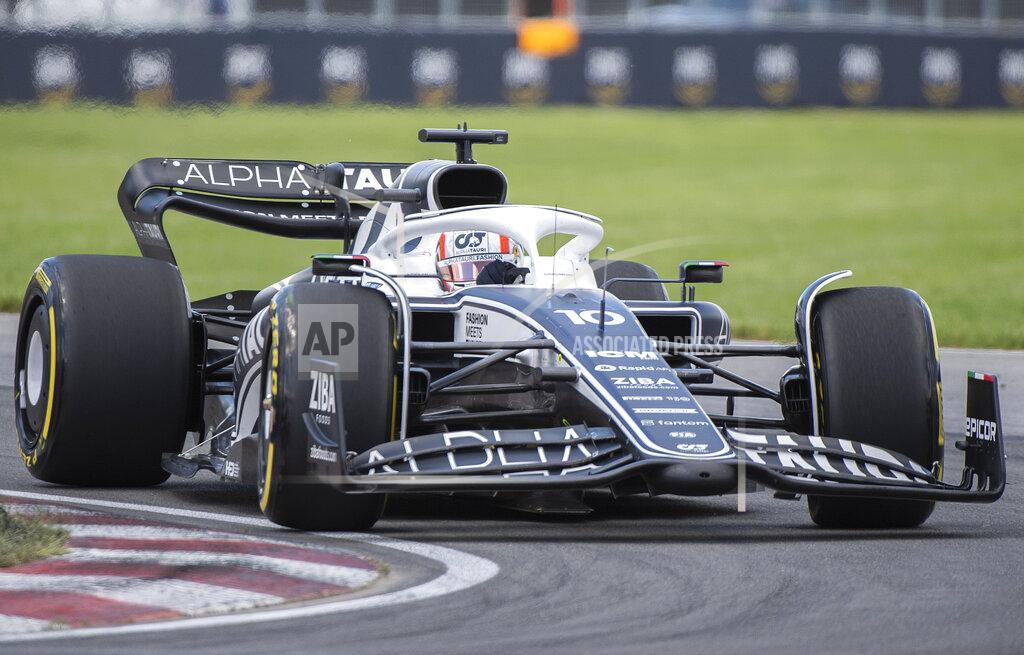 Graham Hughes Alpha Tauri driver Pierre Gasly, of France, takes a turn at the Senna corner during the first practice session at the Formula One Canadian Grand Prix auto race in Montreal, Friday, June 17, 2022. (Graham Hughes/The Canadian Press via AP)