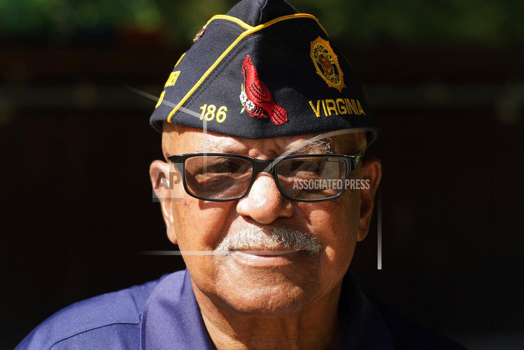 Steve Helber Army veteran Willie Ransom poses at the American Legion Lodge named after his son, Air Force Major Charles Ransom in Midlothian, Va., Thursday, May 27, 2021. The younger Ransom was among eight U.S. Airmen killed when an Afghan military pilot opened fire at the Kabul airport in 2011. (AP Photo/Steve Helber)