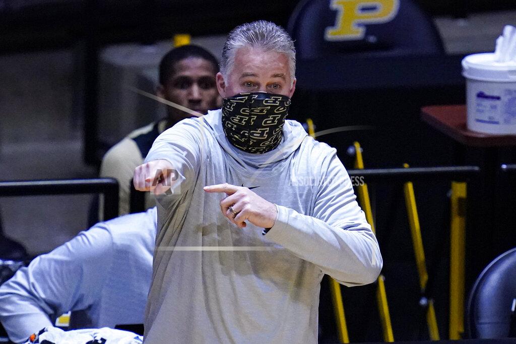 Michael Conroy Purdue head coach Matt Painter gestures during the first half of an NCAA college basketball game against Maryland in West Lafayette, Ind., Friday, Dec. 25, 2020. (AP Photo/Michael Conroy)
