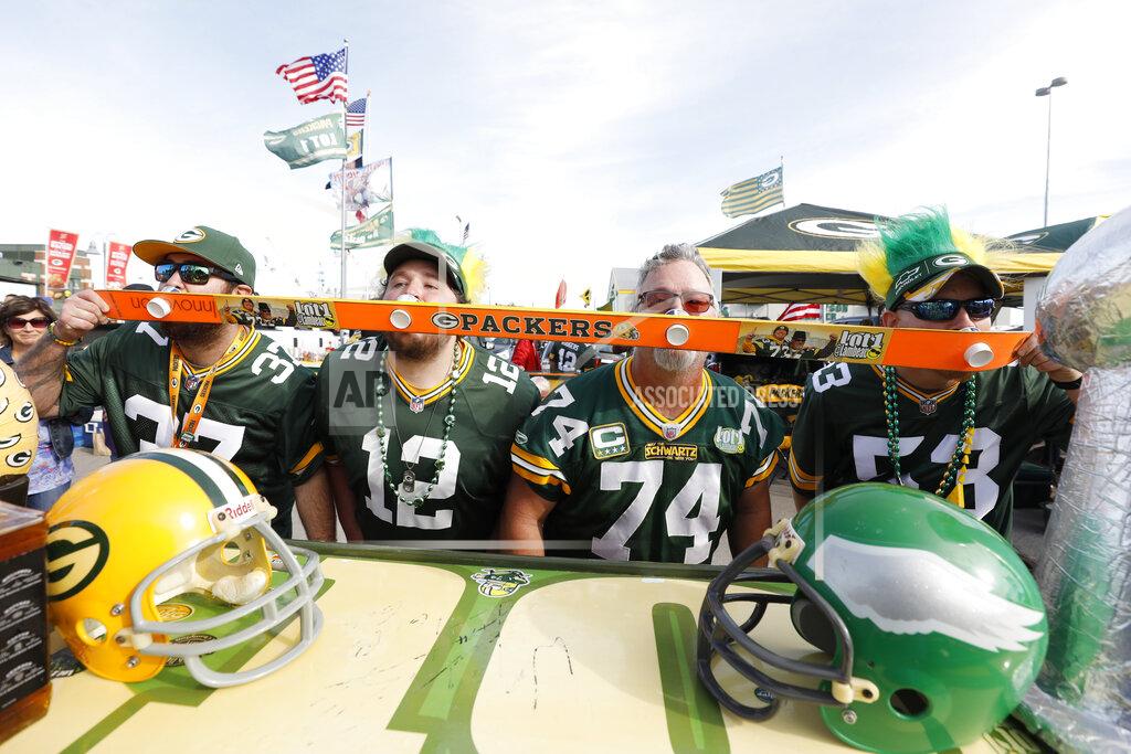 Jeffrey Phelps Green Bay Packers fans tailgate outside Lambeau Field before an NFL football game between Packers and the Philadelphia Eagles, Thursday, Sept. 26, 2019, in Green Bay, Wis. (AP Photo/Jeffrey Phelps)