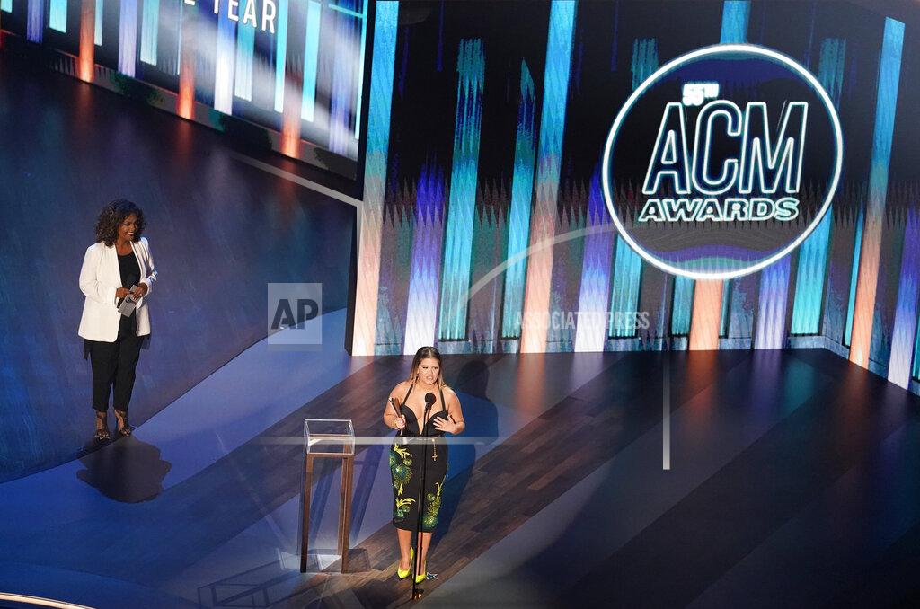 Mark Humphrey Maren Morris accepts the female artist of the year award as presenter CeCe Winans, left, looks on during the 55th annual Academy of Country Music Awards at the Grand Ole Opry House on Wednesday, Sept. 16, 2020, in Nashville, Tenn. (AP Photo/Mark Humphrey)