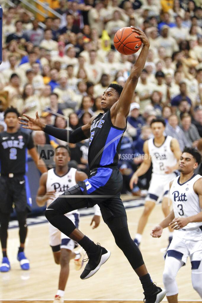 Keith Srakocic Duke's RJ Barrett (5) goes up for a dunk on a break away in front of Pittsburgh's Malik Ellison (3) during the second half of an NCAA college basketball game, Tuesday, Jan. 22, 2019, in Pittsburgh. (AP Photo/Keith Srakocic)