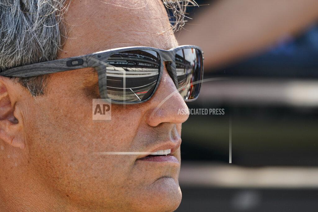 Michael Conroy Juan Pablo Montoya, of Colombia, watches from the pit area during practice for the IndyCar auto race at Indianapolis Motor Speedway in Indianapolis, Friday, May 20, 2022. (AP Photo/Michael Conroy)