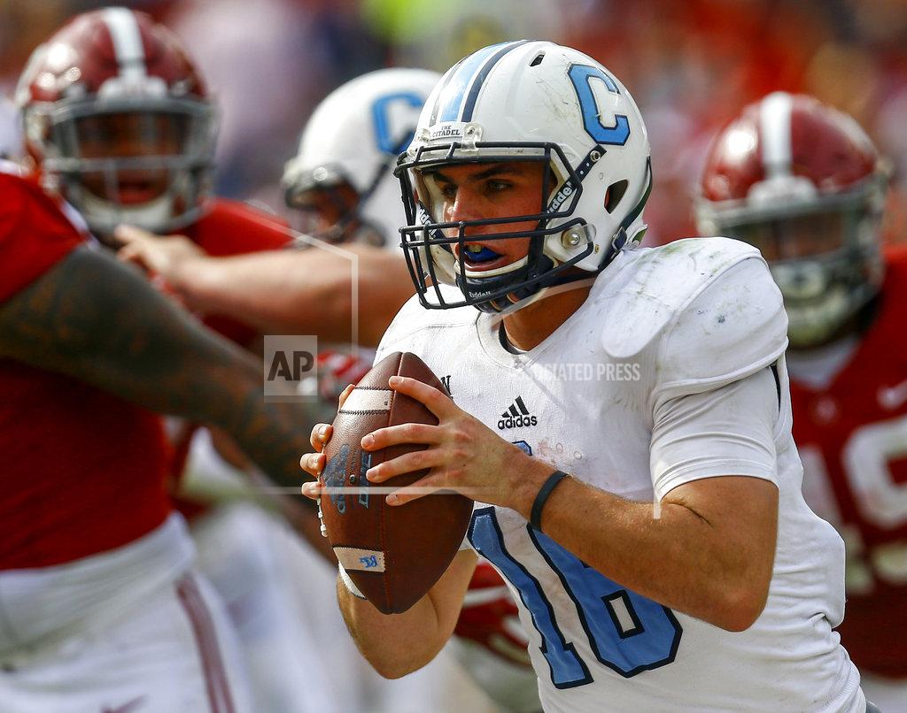 Butch Dill Citadel quarterback Brandon Rainey (16) rolls out to pass against Alabama during the second half of an NCAA college football game, Saturday, Nov. 17, 2018, in Tuscaloosa, Ala. (AP Photo/Butch Dill)