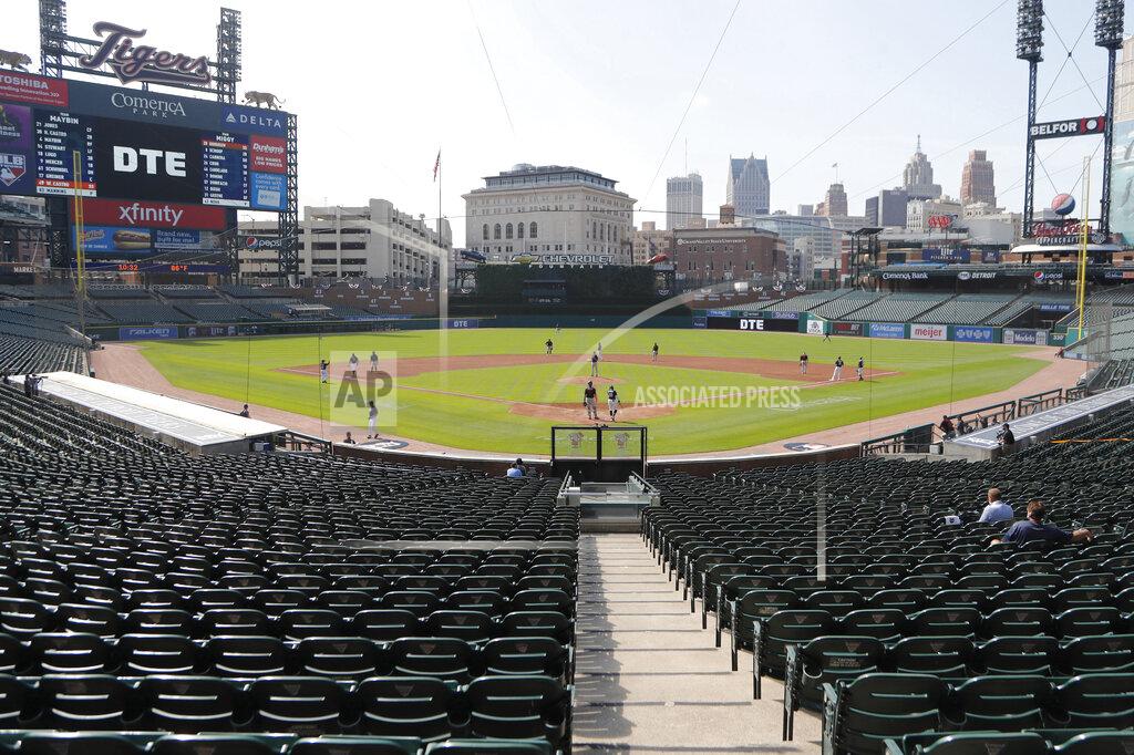 Carlos Osorio FILE - In this Friday, July 10, 2020, file photo, the Detroit Tigers play an intrasquad baseball game, in Detroit. The Tigers will play soon at Comerica Park, one of three sporting venues clustered within a mile of each other in the Motor City. With professional teams from four major leagues playing so close to each other, downtown Detroit is unique. And, that makes the COVID-19 pandemic hit a little harder here. For businesses in the area it has lately been a bust for those banking on a revenue stream from fans. (AP Photo/Carlos Osorio, File)