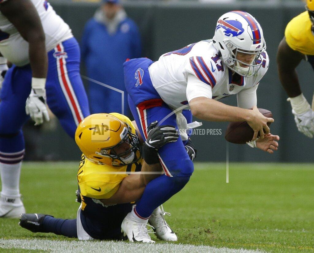 Mike Roemer FILE - In this Sept. 30, 2018, file photo, Green Bay Packers' Kyler Fackrell sacks Buffalo Bills' Josh Allen during the second half of an NFL football game in Green Bay, Wis. The New York Giants are giving free agent linebacker Kyler Fackrell a chance to show that 2019 wasn't as bad as the numbers made it look. It's a one-year shot for Fackrell to prove his 10-1/2 sack season in 2018 with the Packers wasn't a fluke. (AP Photo/Mike Roemer, File)
