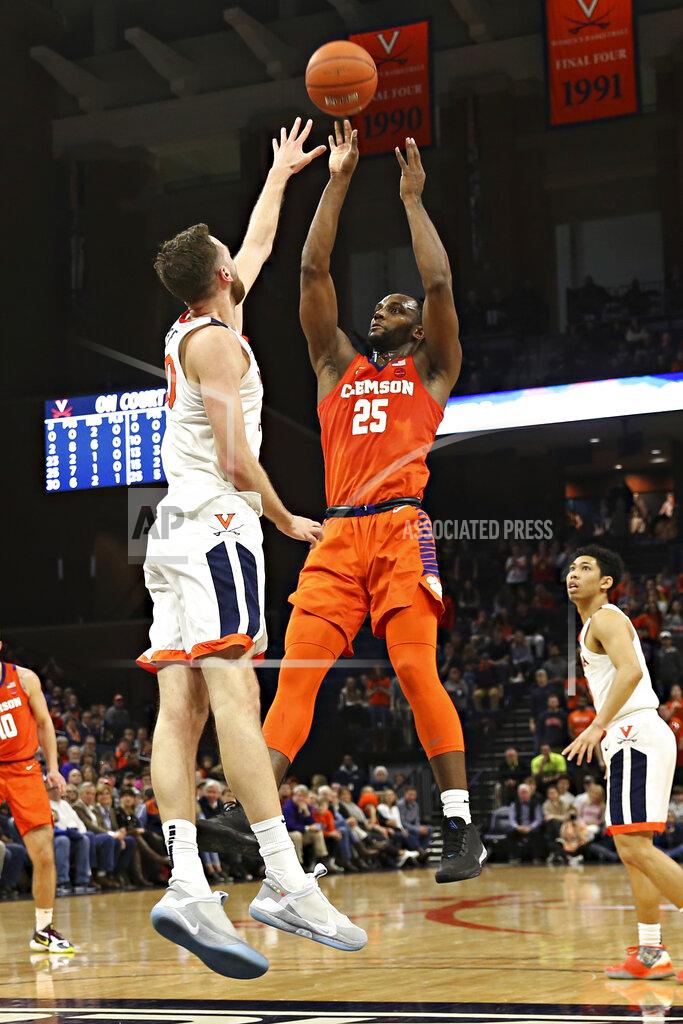 Erin Edgerton Clemson forward Aamir Simms (25) shoots over a Virginia defender during an NCAA college basketball game Wednesday, Feb. 5, 2020, in Charlottesville, Va. (Erin Edgerton/The Daily Progress via AP)