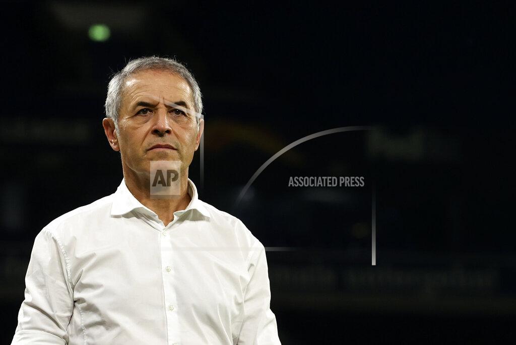 Wolgang Rattay FC Basel's head coach Marcel Koller addresses the media after the Europa League quarter finals soccer match between FC Shakhtar Donetsk and FC Basel at the Veltins-Arena in Gelsenkirchen, Germany, Tuesday, Aug. 11, 2020. (Wolgang Rattay/Pool Photo via AP)