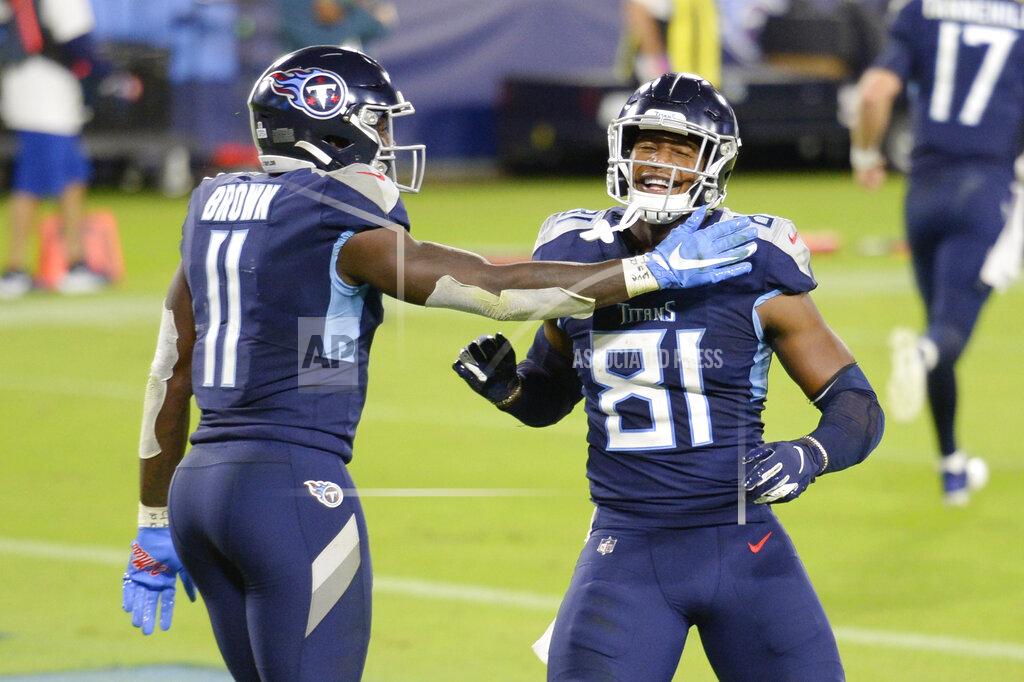 Mark Zaleski Tennessee Titans tight end Jonnu Smith (81) is congratulated by wide receiver A.J. Brown (11) after Smith caught a touchdown pass against the Buffalo Bills in the second half of an NFL football game Tuesday, Oct. 13, 2020, in Nashville, Tenn. (AP Photo/Mark Zaleski)