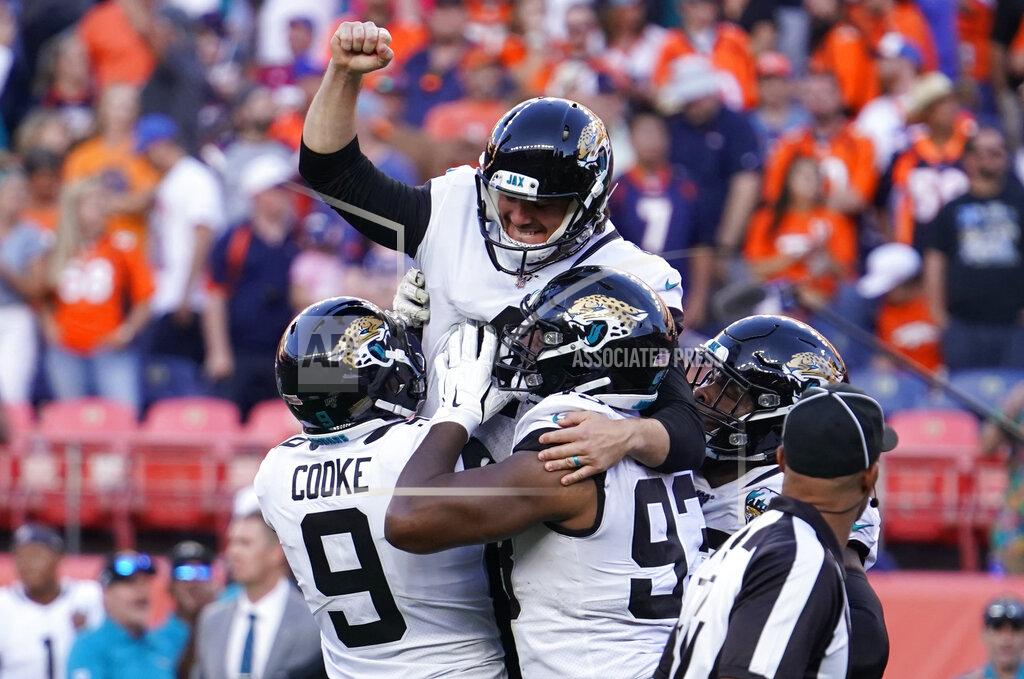 Jack Dempsey Jacksonville Jaguars kicker Josh Lambo, above, celebrates with teammates after making a game-winning field goal during the second half of an NFL football game against the Denver Broncos, Sunday, Sept. 29, 2019, in Denver. (AP Photo/Jack Dempsey)