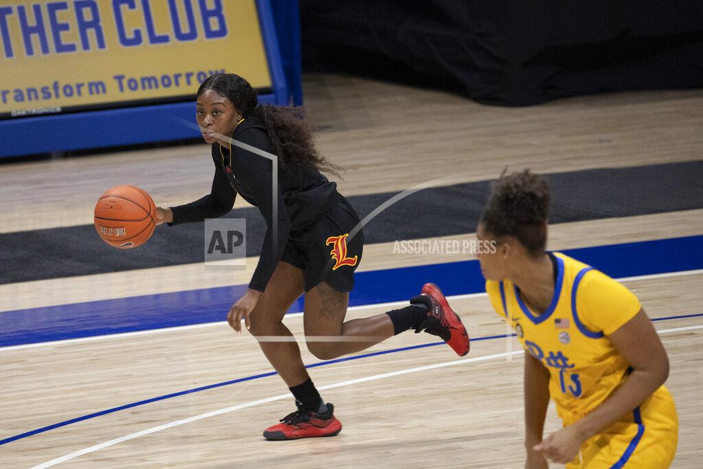 Rebecca Droke Louisville's Dana Evans (1) moves the ball down the court during the second half of an NCAA college basketball game, Thursday, Feb. 18, 2021, in Pittsburgh. Louisville defeated Pittsburgh 82-58. (AP Photo/Rebecca Droke)