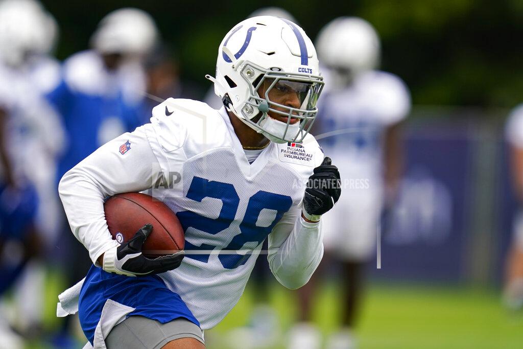 Michael Conroy Indianapolis Colts running back Jonathan Taylor runs a drill during practice at the NFL team's football training camp in Westfield, Ind., Saturday, July 31, 2021. (AP Photo/Michael Conroy)