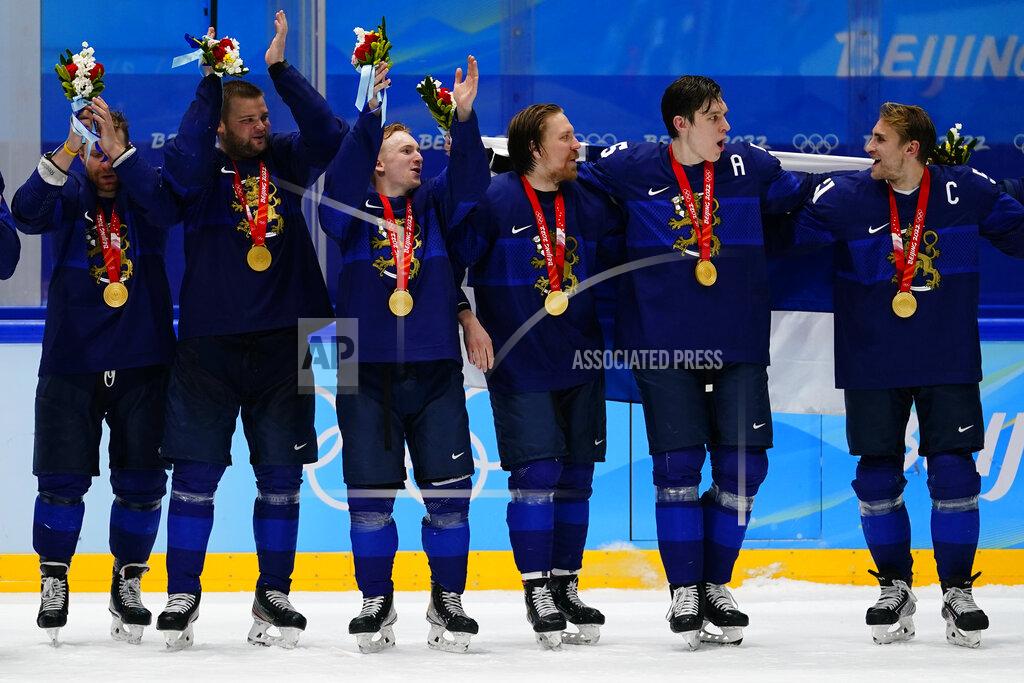 Matt Slocum Finland players celebrate after winning the men's gold medal hockey game against Russian Olympic Committee at the 2022 Winter Olympics, Sunday, Feb. 20, 2022, in Beijing. (AP Photo/Matt Slocum)