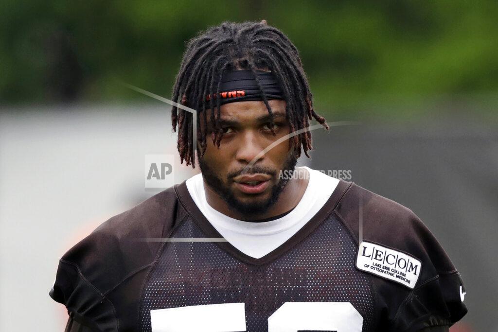 FILE - In this May 30, 2019, file photo, Cleveland Browns outside linebacker Christian Kirksey walks off the field after an NFL football organized team activity session at the team's training facility in Berea, Ohio. The Browns on Tuesday, March 10, 2020, released linebacker Christian Kirksey, a veteran who left his mark on the field and throughout the community during his six seasons in Cleveland. (AP Photo/Tony Dejak, File)