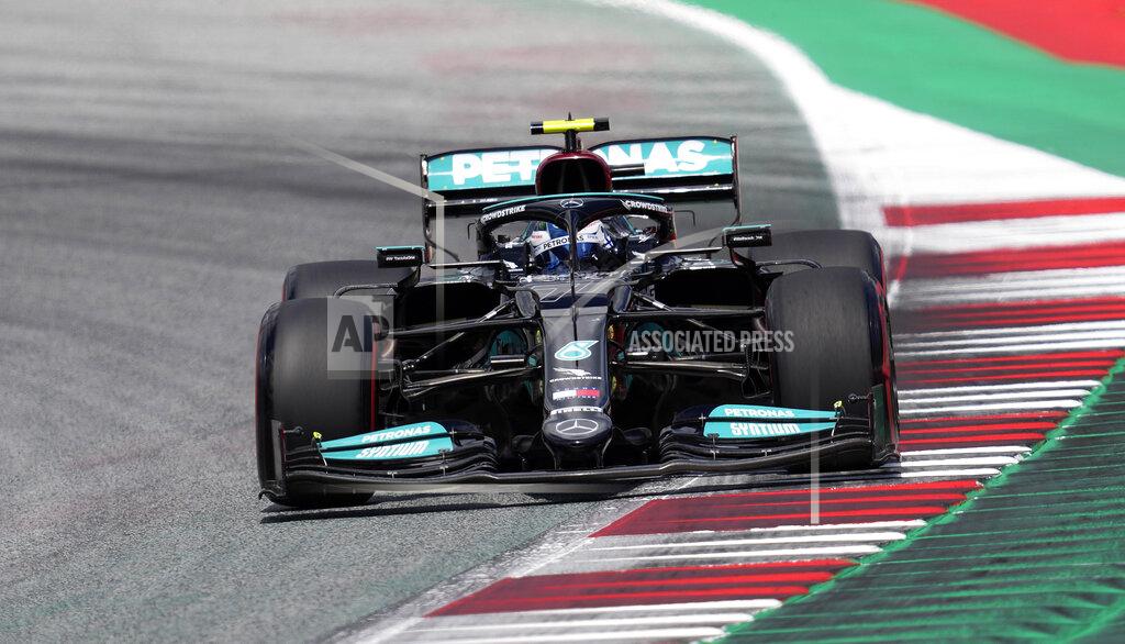 Darko Vojinovic Mercedes driver Valtteri Bottas of Finland steers his car during the qualifying at the Red Bull Ring racetrack in Spielberg, Austria, Saturday, June 26, 2021. The Styrian Formula One Grand Prix will be held on Sunday, June 27, 2021. (AP Photo/Darko Vojinovic)
