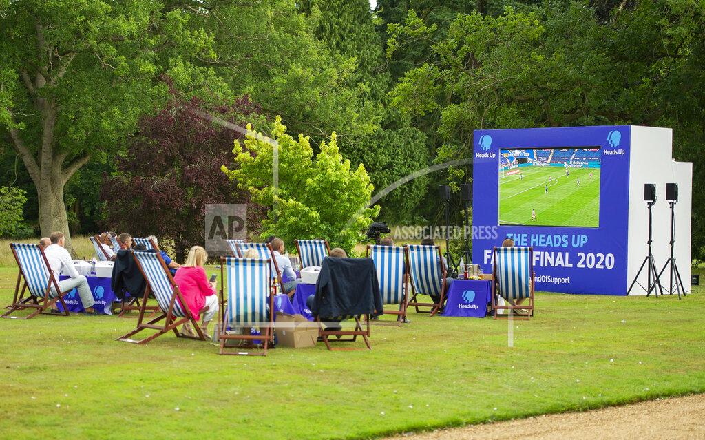 Tim Merry Britain's Prince William sits with representatives from Heads Up, Calm, Mind and Shout, and frontline workers from Norfolk, during a screening of the Heads Up FA Cup Final between Arsenal and Chelsea, at the Sandringham Estate to mark the culmination of the Heads Up campaign, in Norfolk, England, Saturday, Aug. 1, 2020. (Tim Merry/Pool Photo via AP)