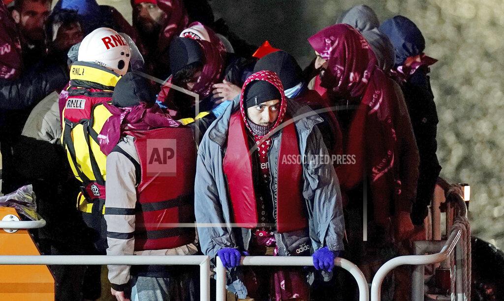 Gareth Fuller A group of people thought to be migrants are brought in to Dover, England by the RNLI, following a small boat incident in the English Channel, Thursday Nov. 25, 2021. On Wednesday around 30 migrants bound for Britain died when their boat sank in the English Channel, in what France’s interior minister called the biggest migration tragedy on the dangerous crossing to date. (Gareth Fuller/PA via AP)