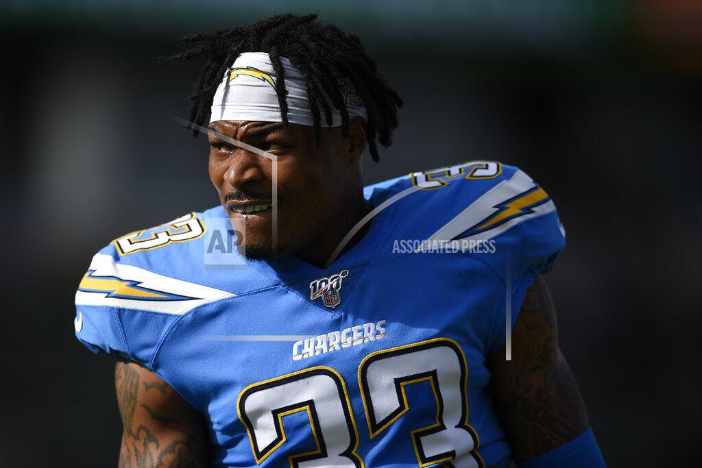 Kelvin Kuo FILE - In this Dec. 22, 2019, file photo, Los Angeles Chargers free safety Derwin James watches during warmups before an NFL football game against the Oakland Raiders in Carson, Calif. The Chargers announced on Friday, April 30, 2021, they have exercised the fifth-year option on James. (AP Photo/Kelvin Kuo, File)