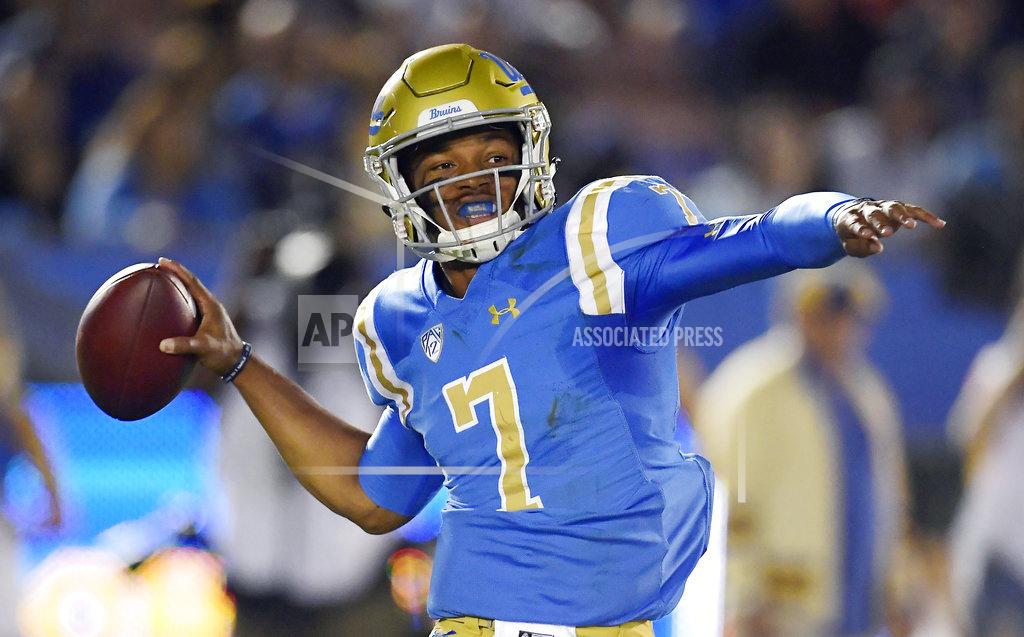 Mark J. Terrill UCLA quarterback Dorian Thompson-Robinson passes during the first half of an NCAA college football game against Arizona, Saturday, Oct. 20, 2018, in Pasadena, Calif. (AP Photo/Mark J. Terrill)