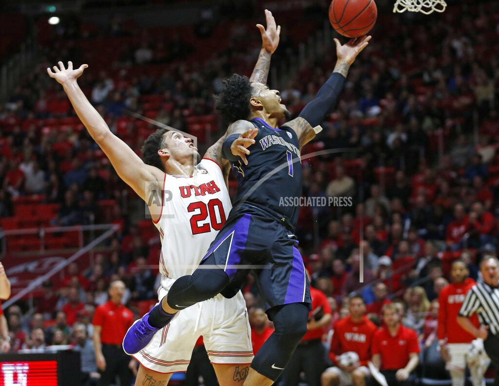 Rick Bowmer Washington guard David Crisp (1) lays the ball up as Utah forward Timmy Allen (20) defends during the first half of an NCAA college basketball game Thursday, Jan., 10, 2019, in Salt Lake City. (AP Photo/Rick Bowmer)