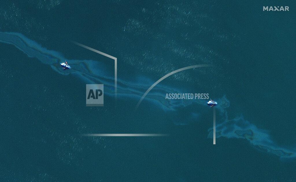 Uncredited This Sept. 4, 2021, satellite image provided by Maxar shows boats in an oil slick in the Gulf of Mexico, south of Port Fourchon, La., in the aftermath of Hurricane Ida. (Satellite image ©2021 Maxar Technologies via AP)
