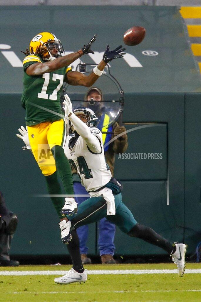 Matt Ludtke Green Bay Packers' Davante Adams catches a touchdown pass during the first half of an NFL football game against the Philadelphia Eagles Sunday, Dec. 6, 2020, in Green Bay, Wis. (AP Photo/Matt Ludtke)