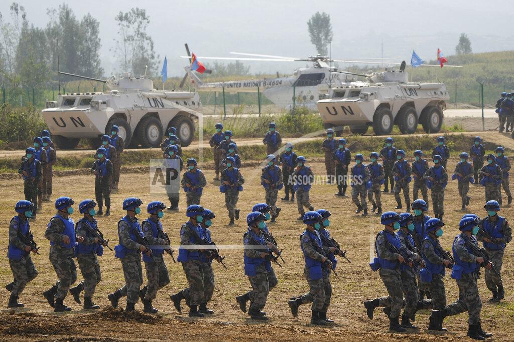 Ng Han Guan Chinese United Nations troop take part in the Shared Destiny 2021 drill at the Queshan Peacekeeping Operation training base in Queshan County in central China's Henan province Wednesday, Sept. 15, 2021. Peacekeeping troops from China, Thailand, Mongolia and Pakistan took part in the 10 days long exercise that field reconnaissance, armed escort, response to terrorist attacks, medical evacuation and epidemic control. (AP Photo/Ng Han Guan)