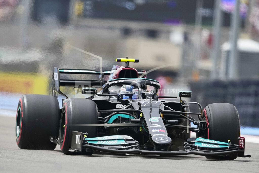 Francois Mori Mercedes driver Valtteri Bottas of Finland steers his car during the qualifying session ahead the French Formula One Grand Prix at the Paul Ricard racetrack in Le Castellet, southern France, Saturday, June 19, 2021. The French Grand Prix will be held on Sunday. (AP Photo/Francois Mori)