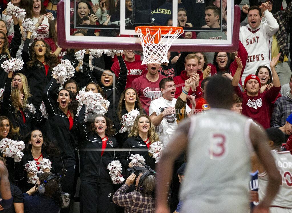 Laurence Kesterson Saint Joseph's fans cheer after Saint Joseph's guard Cameron Brown (3) made a three point shot during the second half of an NCAA college basketball game against Villanova, Saturday, Dec. 7, 2019, in Philadelphia. Villanova won 78-66. (AP Photo/Laurence Kesterson)