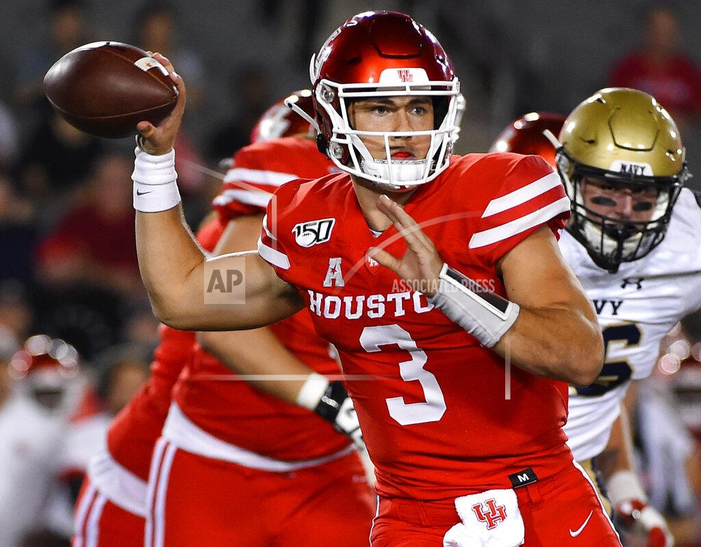 Eric Christian Smith Houston quarterback Clayton Tune (3) throws a pass during the first half of an NCAA college football game against Navy, Saturday, Nov. 30, 2019, in Houston. (AP Photo/Eric Christian Smith)