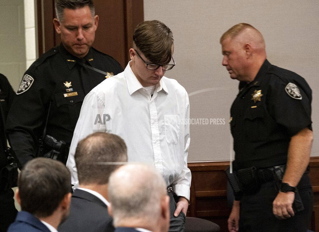 Ben Gray Robert Aaron Long enters Superior Court of Cherokee County in Canton, Ga. on Tuesday, July 27, 2021. Long, accused of killing eight people, most of them women of Asian descent at an Atlanta-area massage businesses pleaded guilty to four of the murders and was handed four sentences of life without parole. (Ben Gray/Atlanta Journal-Constitution via AP, Pool)