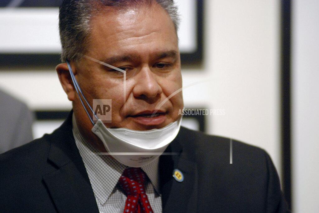 Morgan Lee Democratic New Mexico state Sen. Michael Padilla of Albuquerque is volunteering his time as a call center expert to look for possible improvements to the state system for distributing unemployment benefits, at a news conference on June 11, 2021, at the state Capitol building in Santa Fe, N.M. Gov. Michelle Lujan Grisham said she will use federal funds to replenish the state's depleted unemployment insurance trust and avoid future tax increases on businesses. New Mexico's Workforce Solutions Department that oversees unemployment claims is embarking on reforms aimed at improving efficiency and service, while cracking down on perpetrators of fraudulent claims. (AP Photo/Morgan Lee)