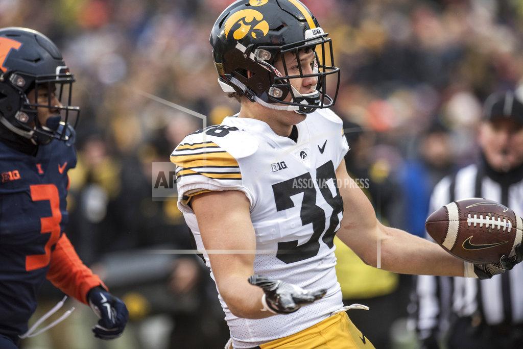 Holly Hart Iowa's T.J. Hockenson (38) enters the end zone with ease in the first half of a NCAA college football game against Illinois, Saturday, Nov. 17, 2018, in Champaign, Ill. (AP Photo/Holly Hart)