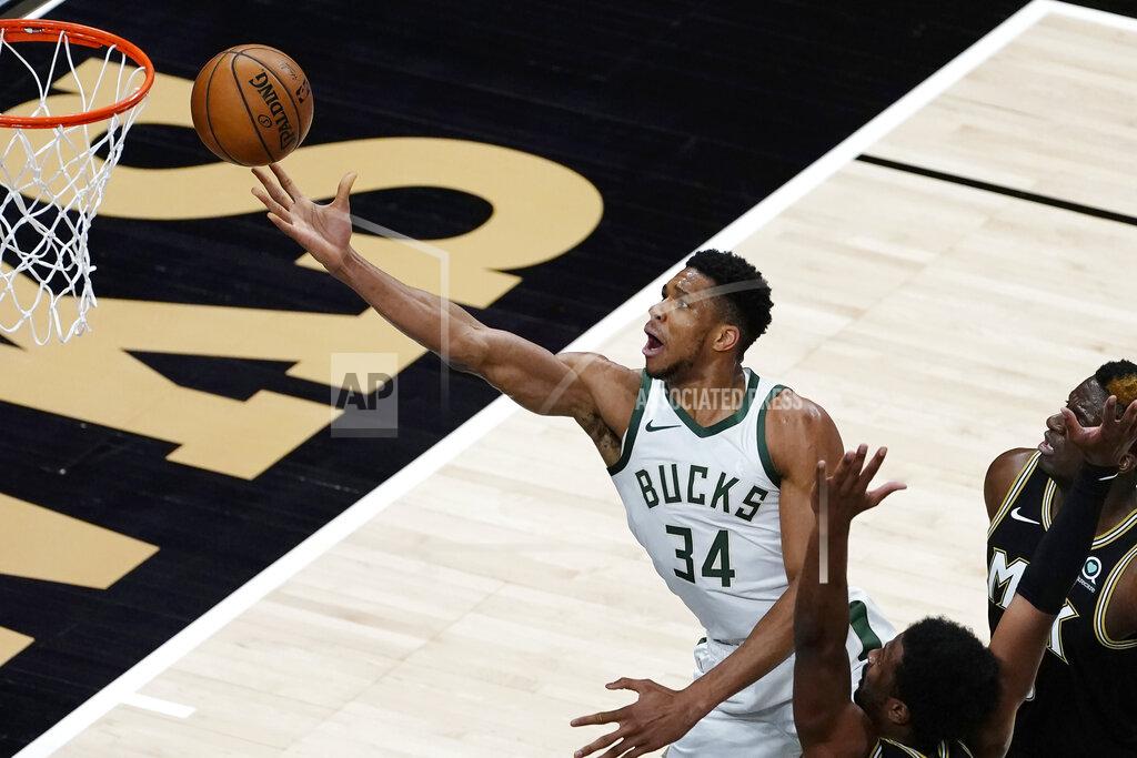 John Bazemore Milwaukee Bucks forward Giannis Antetokounmpo (34) releases a shot against the Atlanta Hawks during the first half of an NBA basketball game Thursday, April 15, 2021, in Atlanta. (AP Photo/John Bazemore)