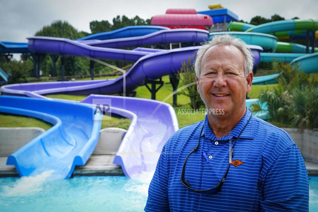 Chris Carlson Mark Lazarus, the president and owner of Lazarus Entertainment Group, poses for a picture, Thursday, July 9, 2020, in Myrtle Beach, S.C. Businesses in beach communities and mountain getaways up and down the East Coast are fretting about a shortage of workers as the summer season picks up steam. The concern comes after the Trump administration announced in June that it was extending a ban on green cards and adding many temporary visas to the freeze, including J-1 cultural exchange visas and H-2B visas. (AP Photo/Chris Carlson)