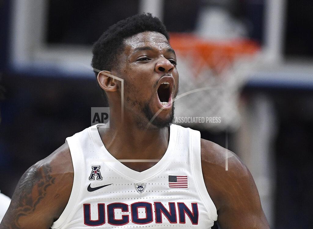 Jessica Hill Connecticut's Eric Cobb reacts during the first half of an NCAA college basketball game against Cincinnati, Sunday, Feb. 24, 2019, in Hartford, Conn. (AP Photo/Jessica Hill)