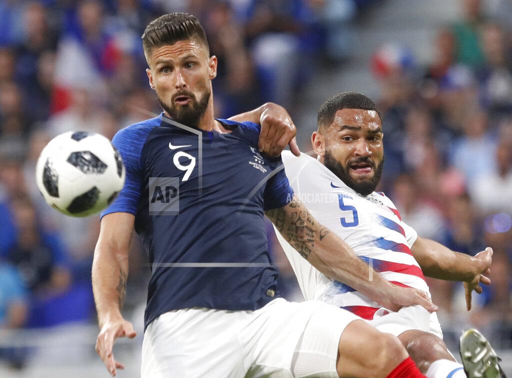 Laurent Cipriani FILE - France's Olivier Giroud, left, battles for the ball with United States' Cameron Carter-Vickers during a friendly soccer match at the Groupama stadium in Decines, near Lyon, central France, June 9, 2018. Glasgow Celtic defender Carter-Vickers and Montreal midfielder Djordje Mihailovic were called in by the U.S., Friday, May 20, 2022, after being bypassed in the 14 qualifiers from September to March. (AP Photo/Laurent Cipriani, File)